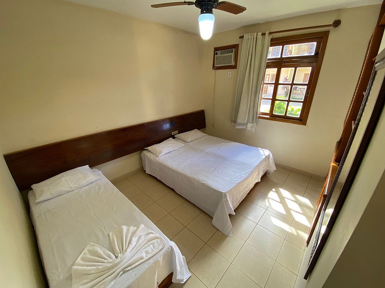 128 - quarto e sala a 100m da praia