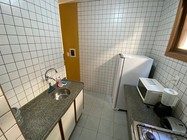 128 - quarto e sala a 100m da praia