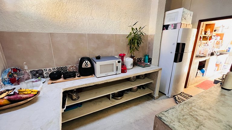 Casa com 4 suítes a 400 m da praia