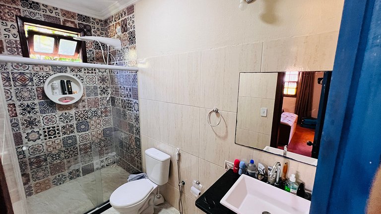 Casa com 4 suítes a 400 m da praia