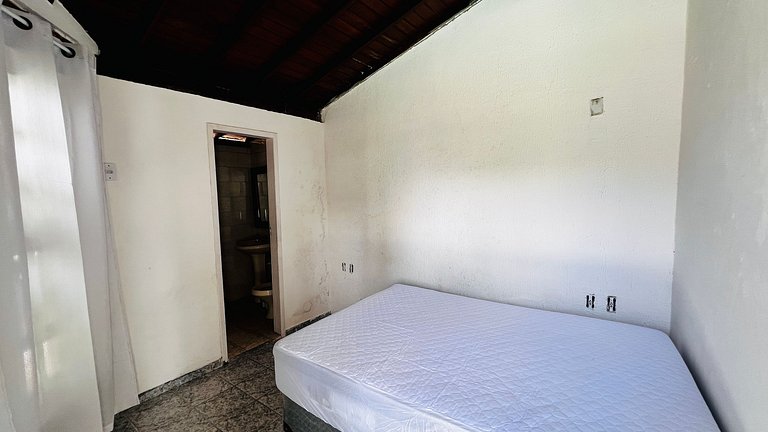 Casa localizada ao lado da balsa e da passarela